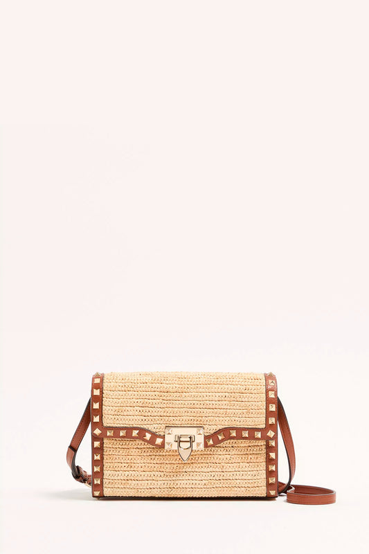 Rockstud Small Shoulder Bag In Raffia